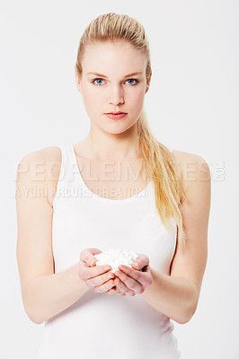 Buy stock photo Many pills, portrait of woman isolated on a white background for infertility, women healthcare danger or drugs risk. Pharmaceutical, medicine and person palms or hands in studio for pharmacy offer
