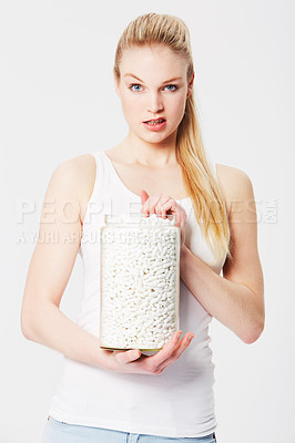Buy stock photo Portrait, annoyed and woman with a jar of pills or big container isolated against a studio white background. Serious female holding medicine, drugs or tablets for capsules looking angry