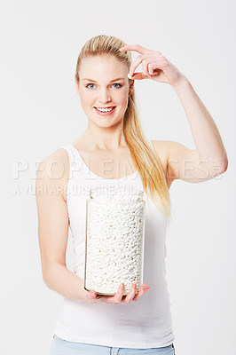 Buy stock photo Pills, medicine jar and portrait of woman on white background with medication, vitamins and drugs in hand. Health mockup, supplements and isolated girl smile with tablets in glass container in studio
