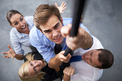 Buy stock photo Corporate people, man and climbing rope for career goals, target or team building exercise with support, motivation and drive. Top view, struggle or portrait of person with hard work on group mission