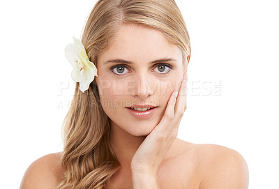 Buy stock photo Woman, portrait and beauty in studio with flower, makeup and pride for cosmetic glow on mock up. Model, person or sustainable dermatology for haircare or natural organic skincare on white background