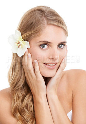 Buy stock photo Woman, portrait and beauty in studio with flower, confidence and pride for cosmetic treatment or glow. Model, person or face with smile for haircare organic skincare, or self care on white background