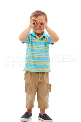 Buy stock photo Hands, binoculars and portrait of kid search, find or inspection in white background of studio. Curious, vision and child with gesture to spy for research, knowledge and learning from sightseeing