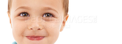 Buy stock photo Child, portrait and closeup in studio or white background for happy development, kindergarten or mockup space. Boy, kid and face or young smile for good mood relax or excited, innocent or playful