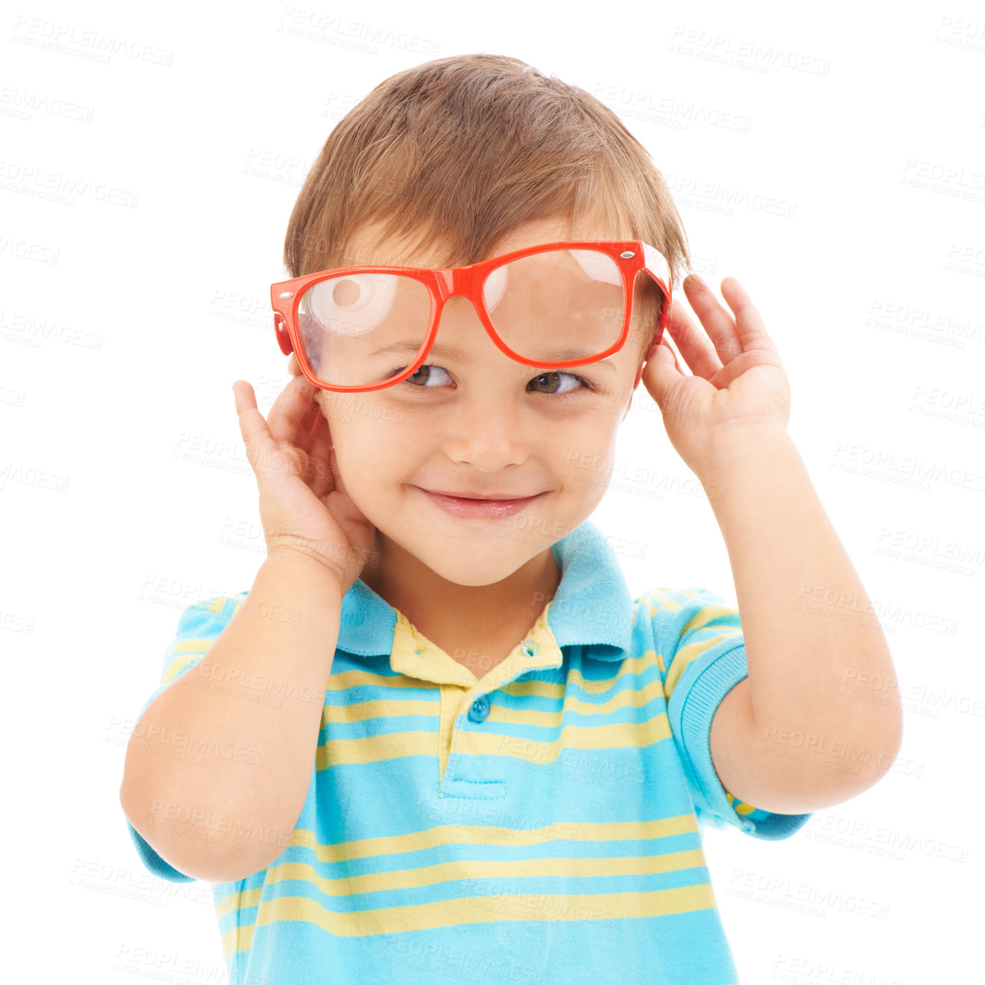 Buy stock photo Child, boy and smile for glasses in studio, eyes and vision support by white background. Happy male person, kid and ophthalmology for eyecare, red spectacles and stylish fashion or humor and goofy