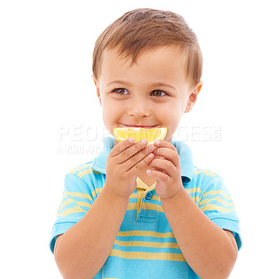 Buy stock photo Eating, lemon and portrait of child with fruit in white background, studio and mockup space. Sour, slice and kid with healthy food, nutrition and citrus in diet for wellness and vitamin c benefits