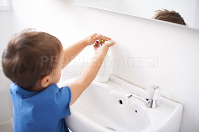 Buy stock photo Child, boy and liquid soap for washing hands in bathroom, hygiene and prevention of germs or bacteria at home. Male person, kid and learning at basin or cleaning and sanitary, water and disinfection