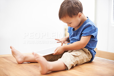 Buy stock photo Boy, tablet and typing with games, kid and internet with network, connection and home. Child development, apartment and technology with online educational activity, relax and digital app for learning