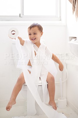 Buy stock photo Boy child, potty training and toilet paper with sitting, mummy and thinking for learning, development or comic game. Child, family home and laugh in bathroom with tissue, hygiene or funny with joke