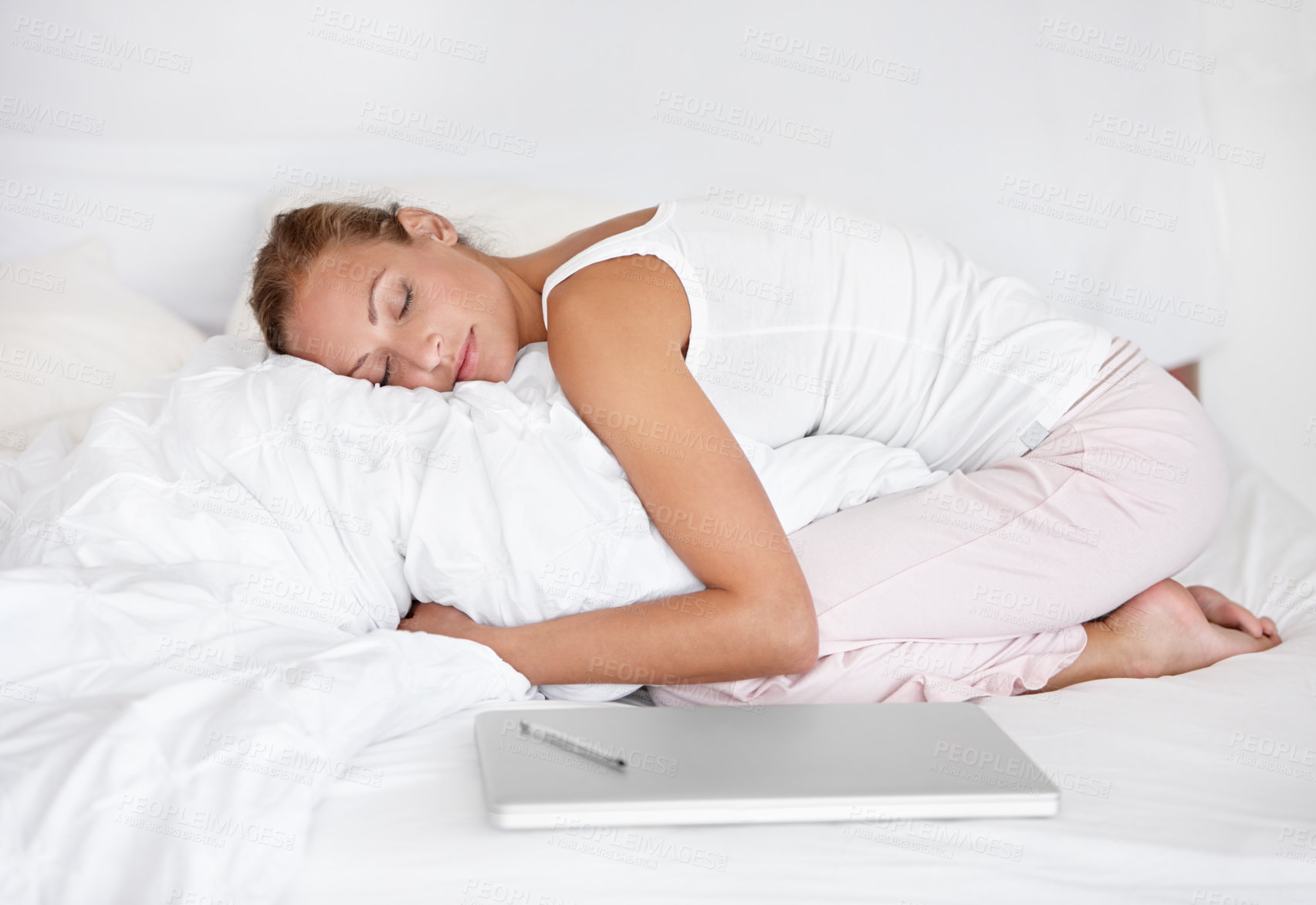 Buy stock photo Woman, morning rest and pillow hug at home from sleep and nap on a bed relax and calm. Peace, wake up and bedroom with a sleepy and tired from remote work with comfort from sheets with dream in house