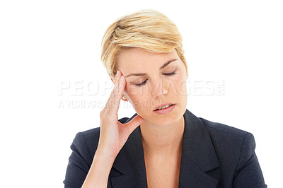 Buy stock photo A young businesswoman suffering from a severe headache