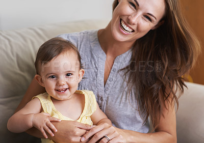 Buy stock photo Mother, baby and smile in portrait at home, love and together for bonding in childhood. Mommy, daughter and support for happy toddler in child development, mama and security or connection on sofa
