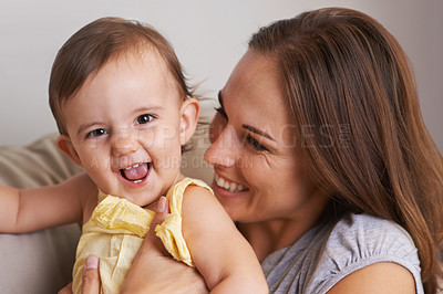 Buy stock photo Closeup portrait of a mother and baby daughter laughing