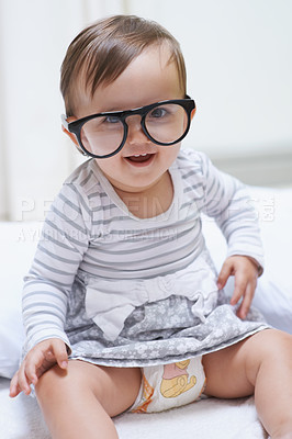Buy stock photo Eye care, portrait or baby with vision glasses for eyesight, prescription lens frame or ocular support. Accessory, pediatric ophthalmology and infant toddler relax, silly and playing with eyeglasses