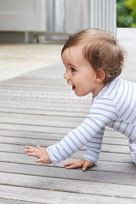 Buy stock photo Baby, crawling outdoor and happy on floor, child development and growth with sensory, coordination and home. Girl, playing and healthy in good mood, childhood or balance with arms, kid or curious

