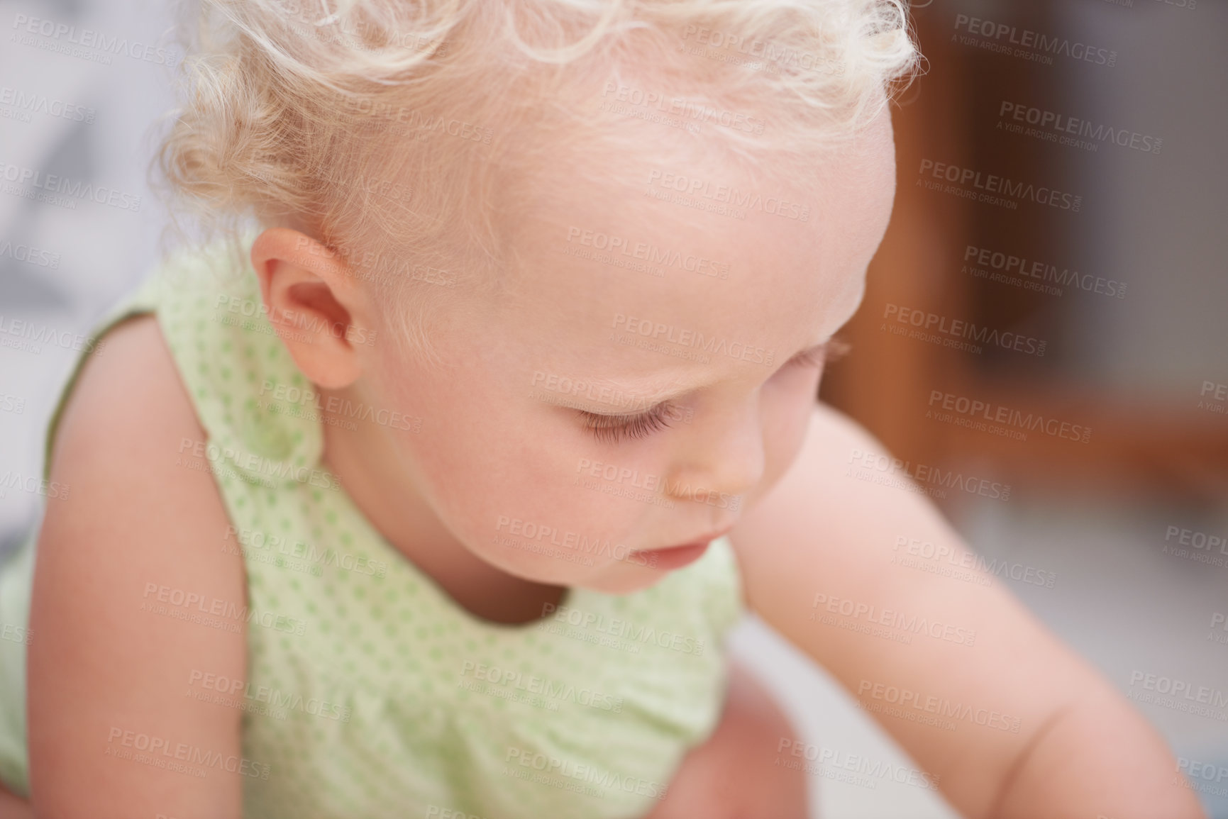 Buy stock photo Baby, child and girl play in home, adorable and cute kid closeup alone in house. Young blonde toddler, innocent and childhood development for learning, education and curious in kindergarten nursery
