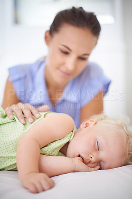 Buy stock photo Sweet, sleeping and mother with baby on bed for bonding, relax and happy cute relationship. Love, smile and young mom watching girl child, kid or toddler taking a nap in bedroom or nursery at home.