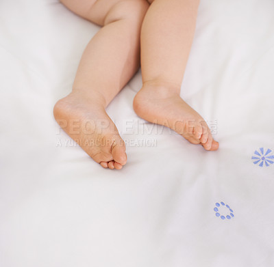 Buy stock photo Baby sleeping, feet and top view on bed to relax, comfort and calm at home on mockup space. Toddler, above and closeup of cute foot, legs of adorable child and young kid resting in peace in bedroom