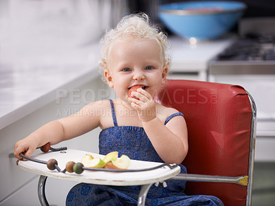 Buy stock photo Portrait, high chair and baby with apple, healthy diet and nutrition for breakfast. Hungry, kid and toddler eating fruit for growth, childhood development and happy cute child with vegan food in home