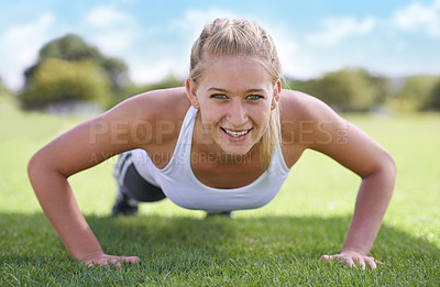 Buy stock photo Women, portrait and push ups on grass for exercise with fitness, training and workout on sports field. Athlete, person and confidence on ground with physical activity for healthy body and wellness