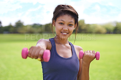 Buy stock photo Woman, portrait and dumbbells outdoor for training with smile for workout, exercise or fitness on sports field. Athlete, person and happy for physical activity or healthy body on grass with equipment