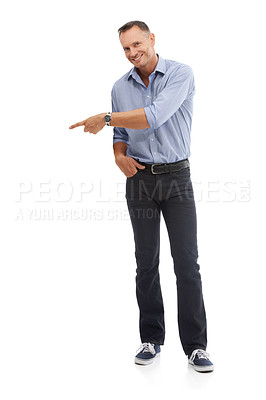 Buy stock photo Portrait, pointing and mockup with a man in studio isolated on a white background for branding or product placement. Point, mock up and advertising with a male on blank space to point at a brand