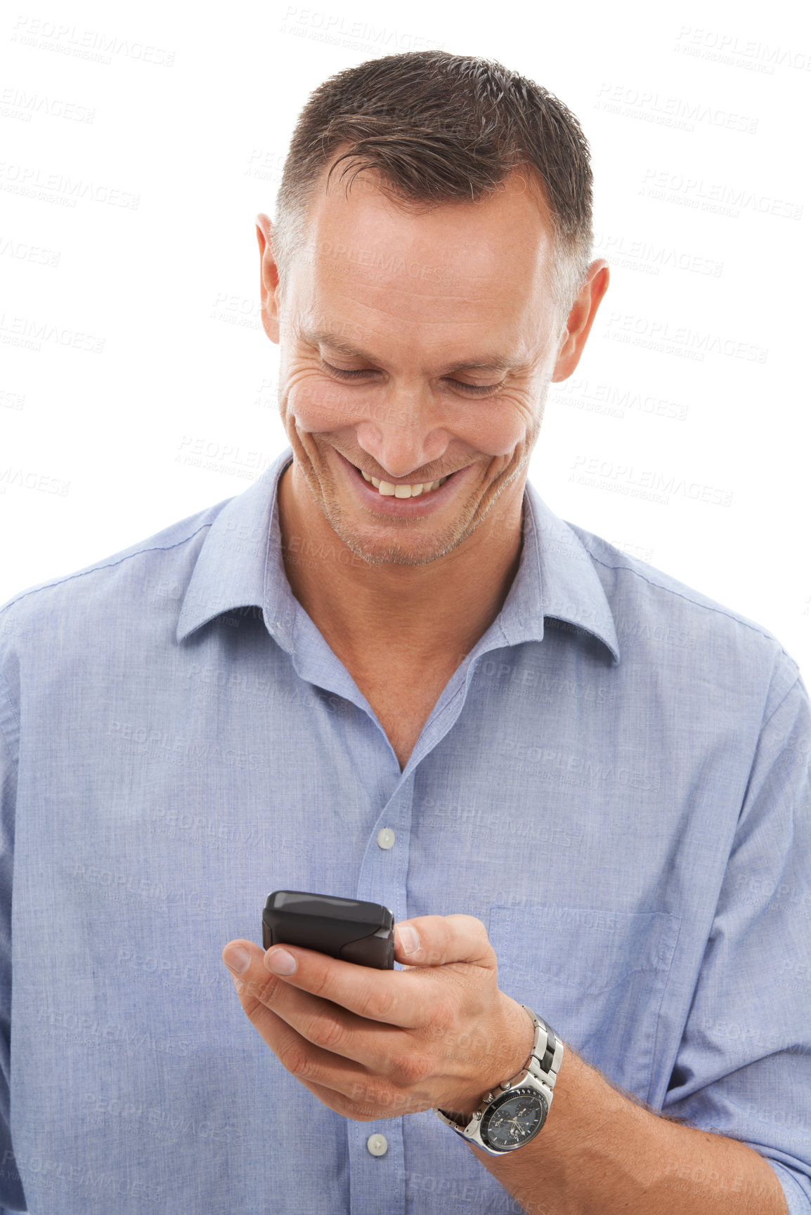 Buy stock photo Typing, business man and phone in studio isolated on a white background for social media. Technology, smartphone and mature male entrepreneur happy with cellphone for networking or text messaging.