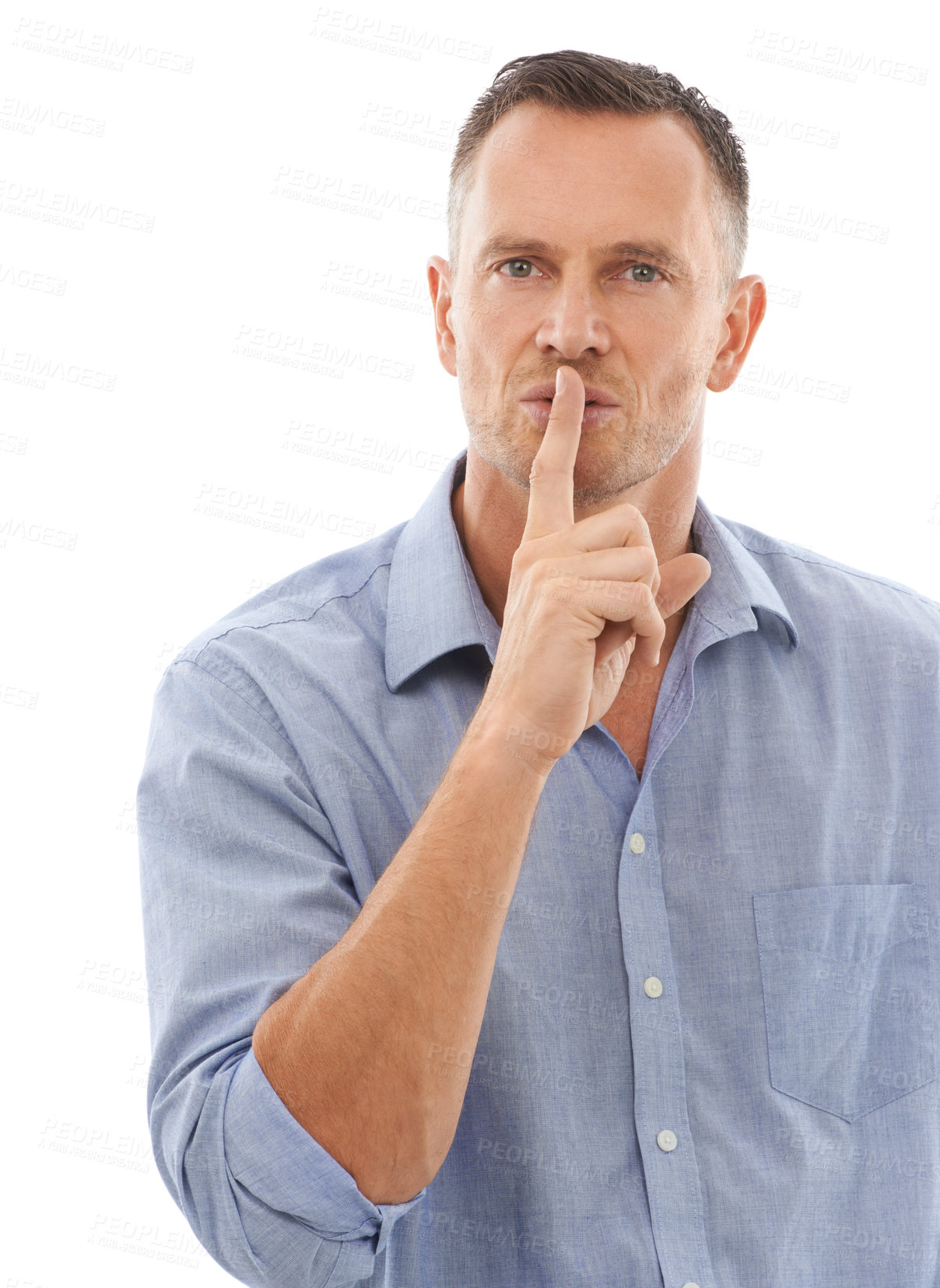 Buy stock photo Secret, quiet and portrait of a man in a studio with a silence, hush or whisper face expression. Person, handsome and mature male model with a finger on his mouth gesture isolated by white background