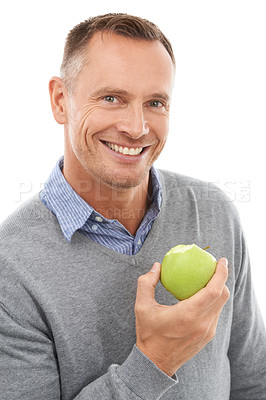 Buy stock photo Healthy apple, studio portrait and man with fruit for health, diet and wellness isolated on a white background. Happy person with vegan nutrition food for green lifestyle, motivation and clean eating