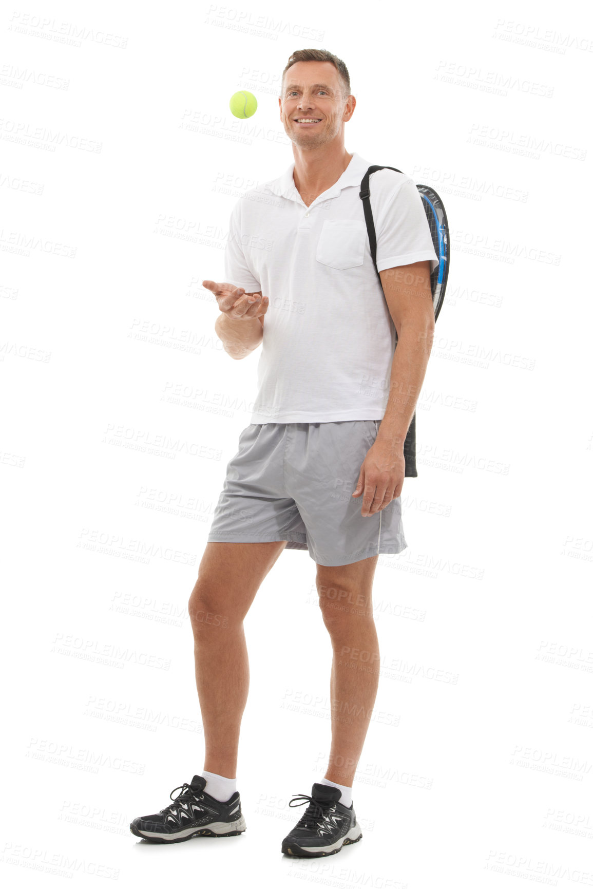 Buy stock photo Portrait, tennis sports and man in studio isolated on a white background for exercise. Training, athlete and mature male with ball and racket ready to start workout for health, fitness and wellness.