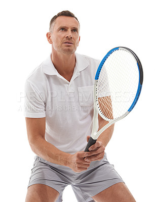 Buy stock photo Tennis, sports fitness and man in studio isolated on a white background for exercise. Training, thinking and mature male holding racket ready to start workout for game practice, health and wellness