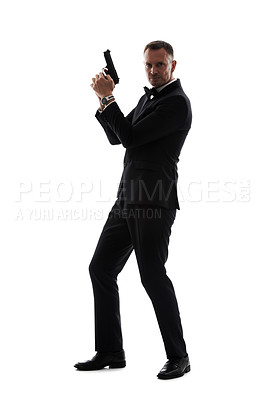 Buy stock photo Portrait, gun and spy with a man in studio isolated on a white background as an agent in a suit or tuxedo. Mission, bodyguard and fashion with a handsome mature male posing alone on blank space