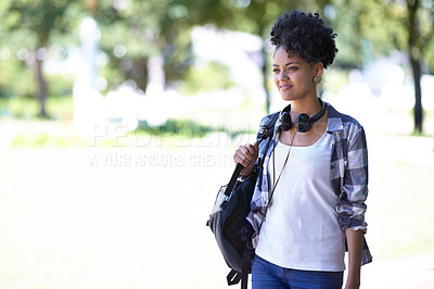 Buy stock photo Woman, headphones and campus student or music for knowledge, scholarship or academic. Female person, smile and backpack at study college academy for university higher education, degree or learning