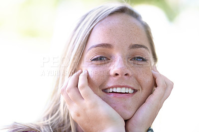 Buy stock photo Portrait, happy and beauty of woman outdoor, touch skin and facial expression in summer. Smile, face and hands of blonde female person, natural and confidence of young girl in nature in Switzerland
