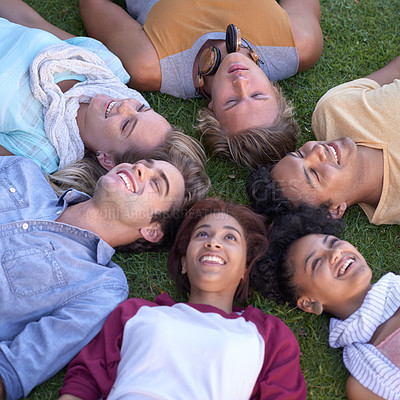 Buy stock photo Top view, friends and group relax on grass at park on vacation, holiday or summer travel. Above, people smile and students on lawn at garden, circle in nature or freedom of community together outdoor