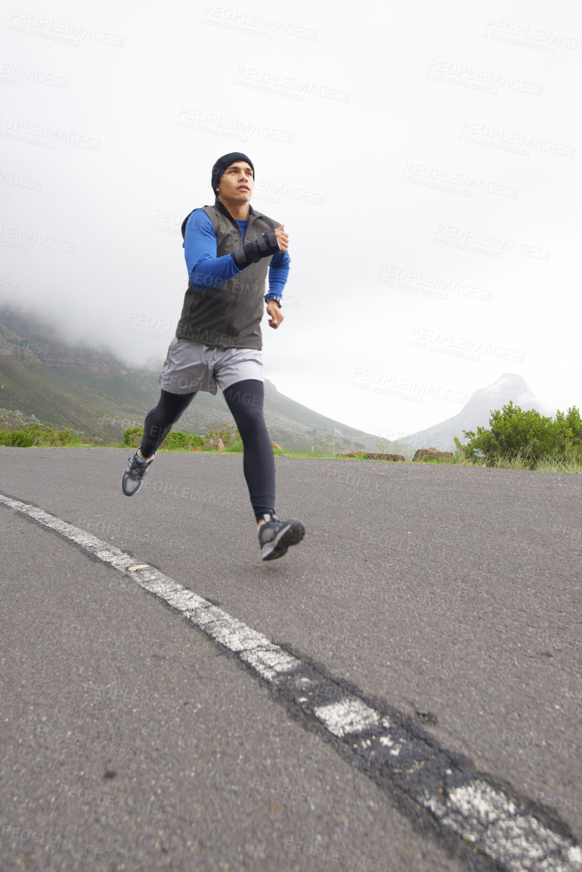 Buy stock photo Sports, fitness and man running on road in training, cardio exercise or endurance workout for wellness. Energy, runner or healthy male athlete on fast jog outdoors with speed, challenge or action 