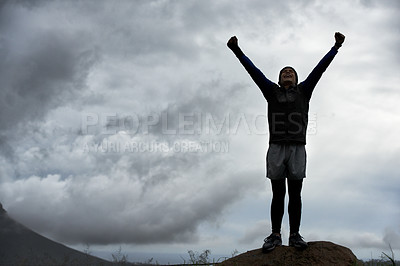 Buy stock photo Happy man, mountain peak space or hands up for celebration in training, exercise or workout success. Excited athlete, sky mockup or hiker with energy, gratitude or freedom in nature for fitness