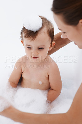 Buy stock photo Baby, mom and foam soap for washing in bath, parent and cleaning for skincare at home. Mommy, toddler and childcare or water for prevention of bacteria and virus, cosmetics and liquid for health