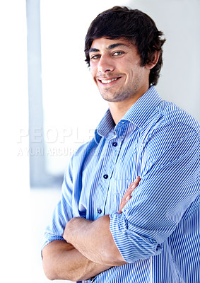Buy stock photo Happy man, portrait and office by window with arms crossed in confidence for career ambition. Face of young handsome male person or professional employee smile with positive attitude at workplace