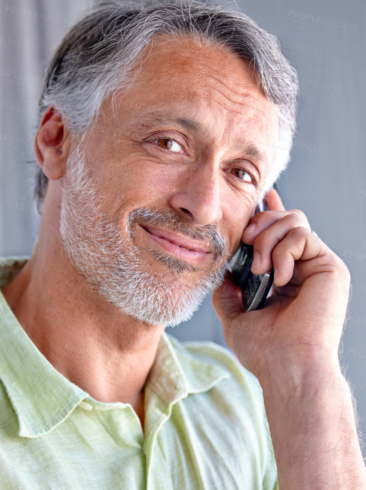 Buy stock photo Mature, portrait or happy man on a phone call talking or listening for communication with smile. Face, retirement or male senior person in home calling to chat in conversation or speaking on mobile
