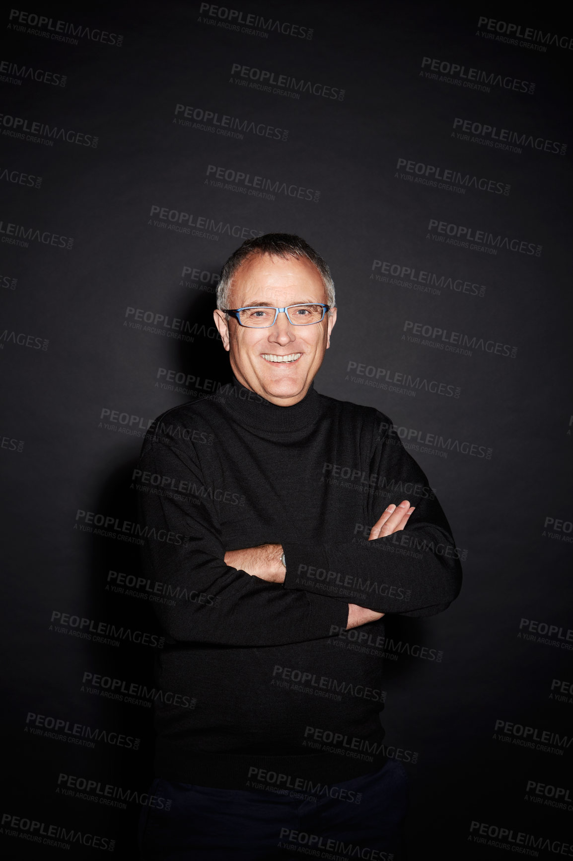 Buy stock photo Portrait of mature man in studio with smile, arms crossed and happy with dark fashion style. Pride, relax and senior person isolated on black background with expert knowledge, glasses and wisdom.