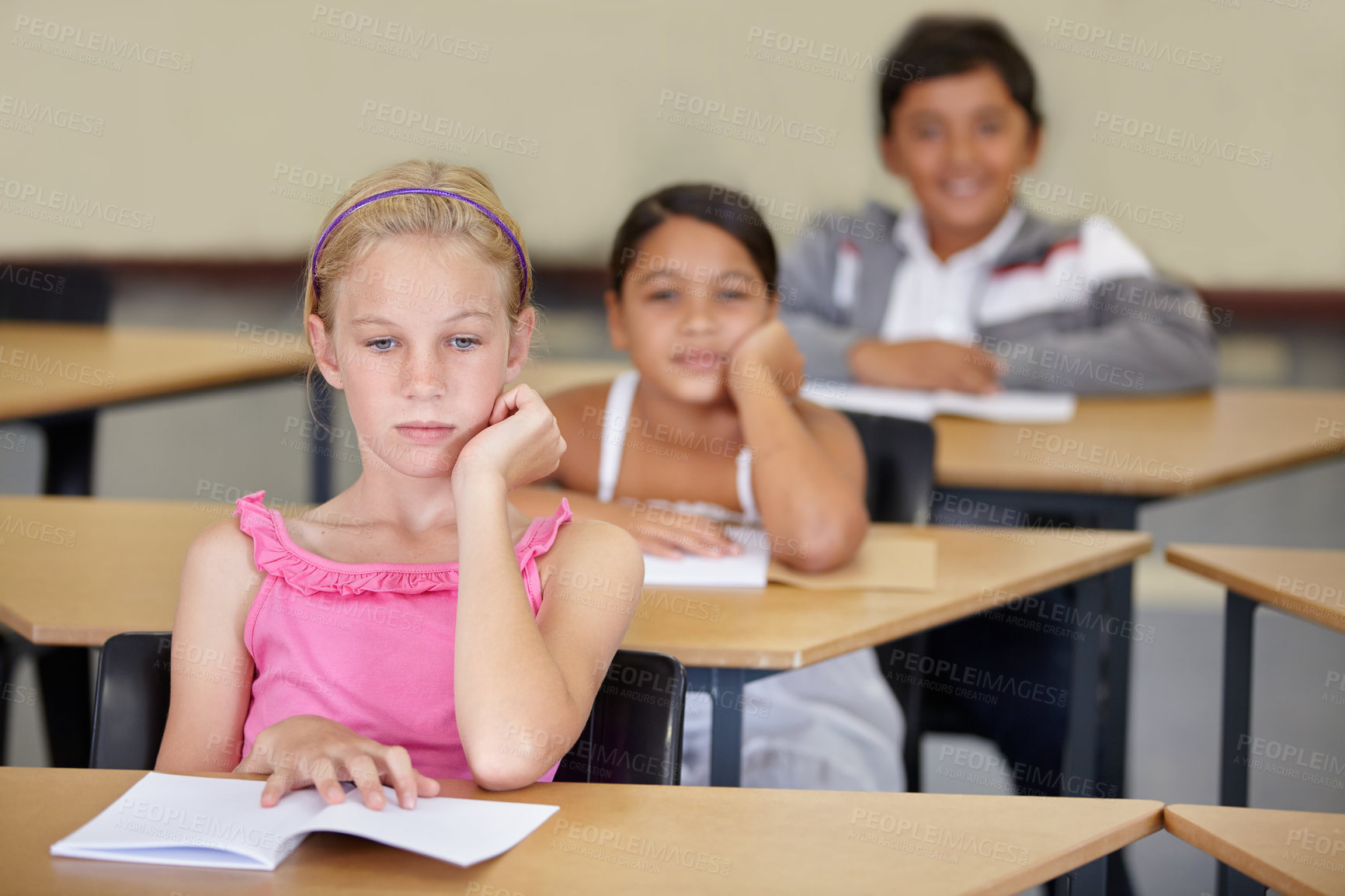 Buy stock photo Tired, children and bored of learning, education and books from adhd, burnout and frustrated with work in school. Exhausted, girl or thinking of studying, group and problem with mindset in classroom