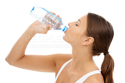 Buy stock photo Fitness, woman and drinking water in studio for exercise break, energy and healthy detox on white background. Thirsty model, liquid hydration and bottle for sports nutrition, weight loss diet or care