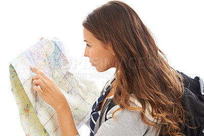 Buy stock photo Map, explore and woman reading in studio for hiking adventure, weekend trip or vacation. Travel, discover and young female person with paper directions for tourism and navigation by white background.