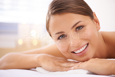 Buy stock photo Relax, portrait and young woman at spa with body massage for health, wellness and self care. Happy, natural and female person with calm, peaceful and serene skin therapy treatment at beauty salon.