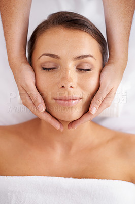 Buy stock photo Woman, facial and massage at spa from above for beauty, skincare treatment and healing at cosmetics salon. Face of calm client relax at wellness resort for reiki, break and peaceful holistic therapy 