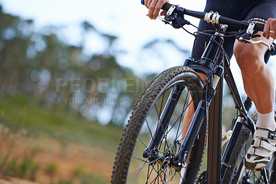 Buy stock photo Hands, bicycle and gear in nature for cycling adventure on off road terrain for extreme sport, performance or cardio. Person, fingers and shifter on mountain gravel or racing, competition or training