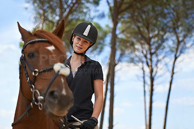 Buy stock photo Equestrian, portrait and riding a horse in nature on adventure, journey and happiness in countryside. Ranch, animal and rider outdoor with hobby, sport and pet on farm with girl on blue sky in summer