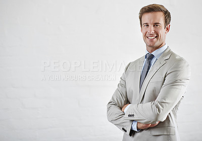 Buy stock photo Portrait, smile and business man with arms crossed for pride in career on mockup space. Confident professional lawyer, face and attorney worker in suit isolated on white wall background in Australia