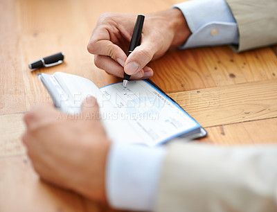 Buy stock photo Hands, businessman sign cheque or accountant closeup and signature for consent or confirmation. Finance or payment, money or investment and financial advisor finalising transaction or paperwork